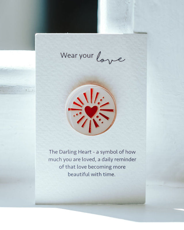 Heart design on a pink pink on a white backing card.