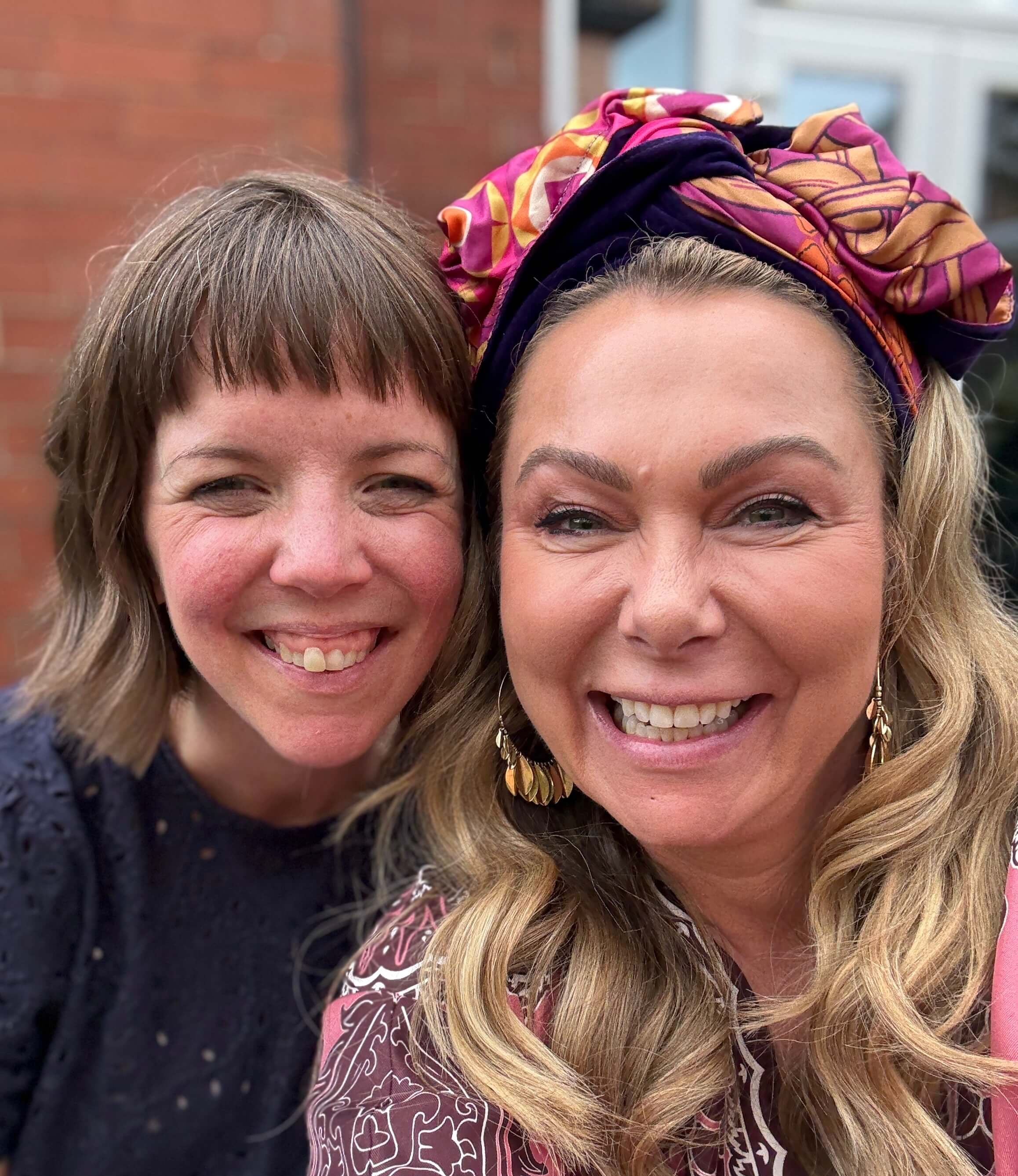 Hannah Weston and Holly Tucker taking a selfie outside