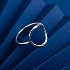 Delicate sterling silver open circle ring with hammered effect by Hannah Weston.