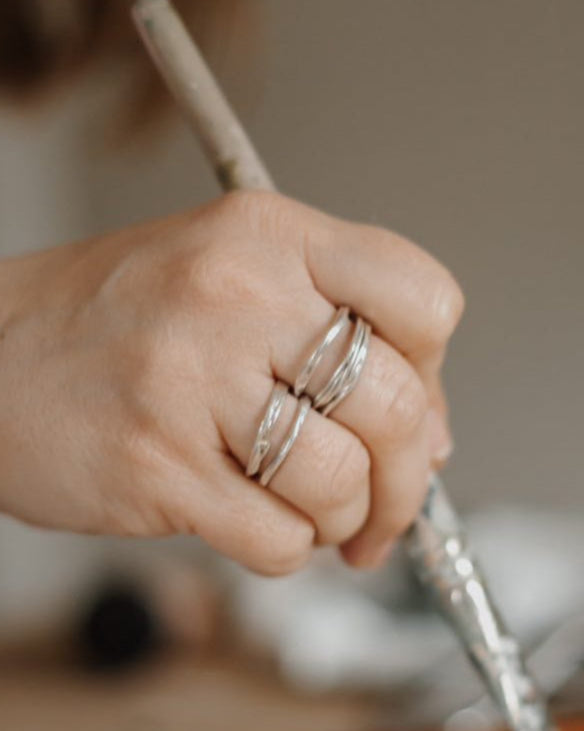 Sterling silver stacking rings handmade by Hannah Weston, UK.