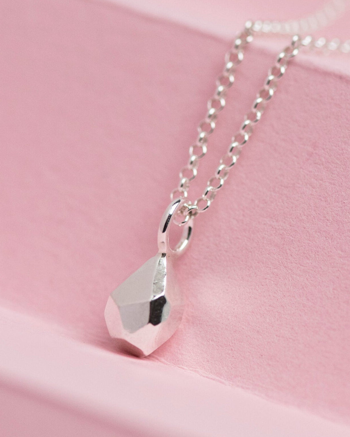 Sterling silver geometric pendant.