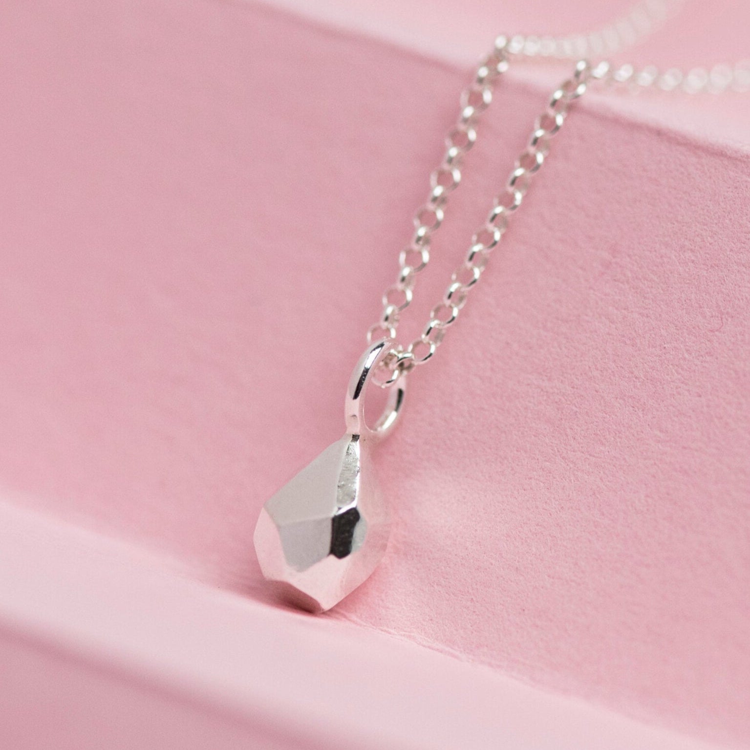 Sterling silver geometric pendant.