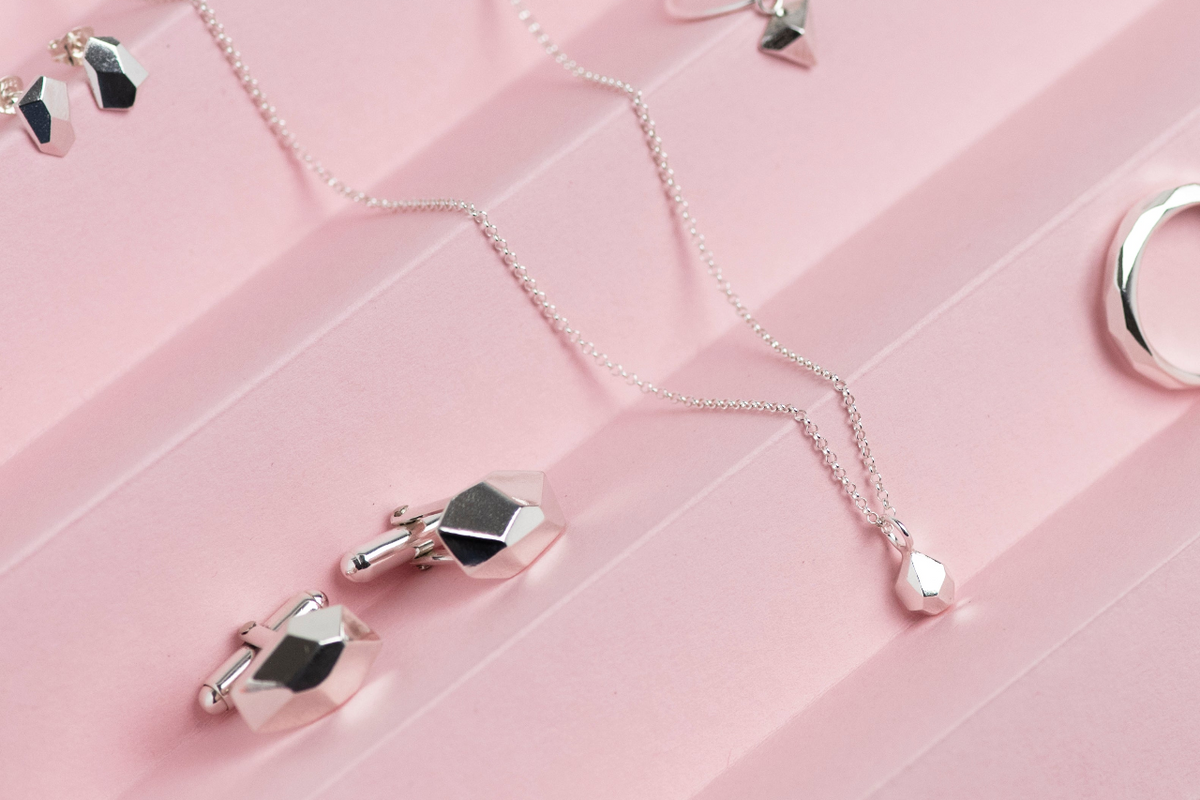 Silver geometric cufflinks, pendant , ring and earrings by Hannah Weston.