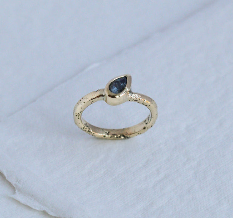 Yellow gold sand cast ring with sapphire. Commission, handmade by Hannah Weston, York.