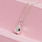 Sterling silver geometric pendant.